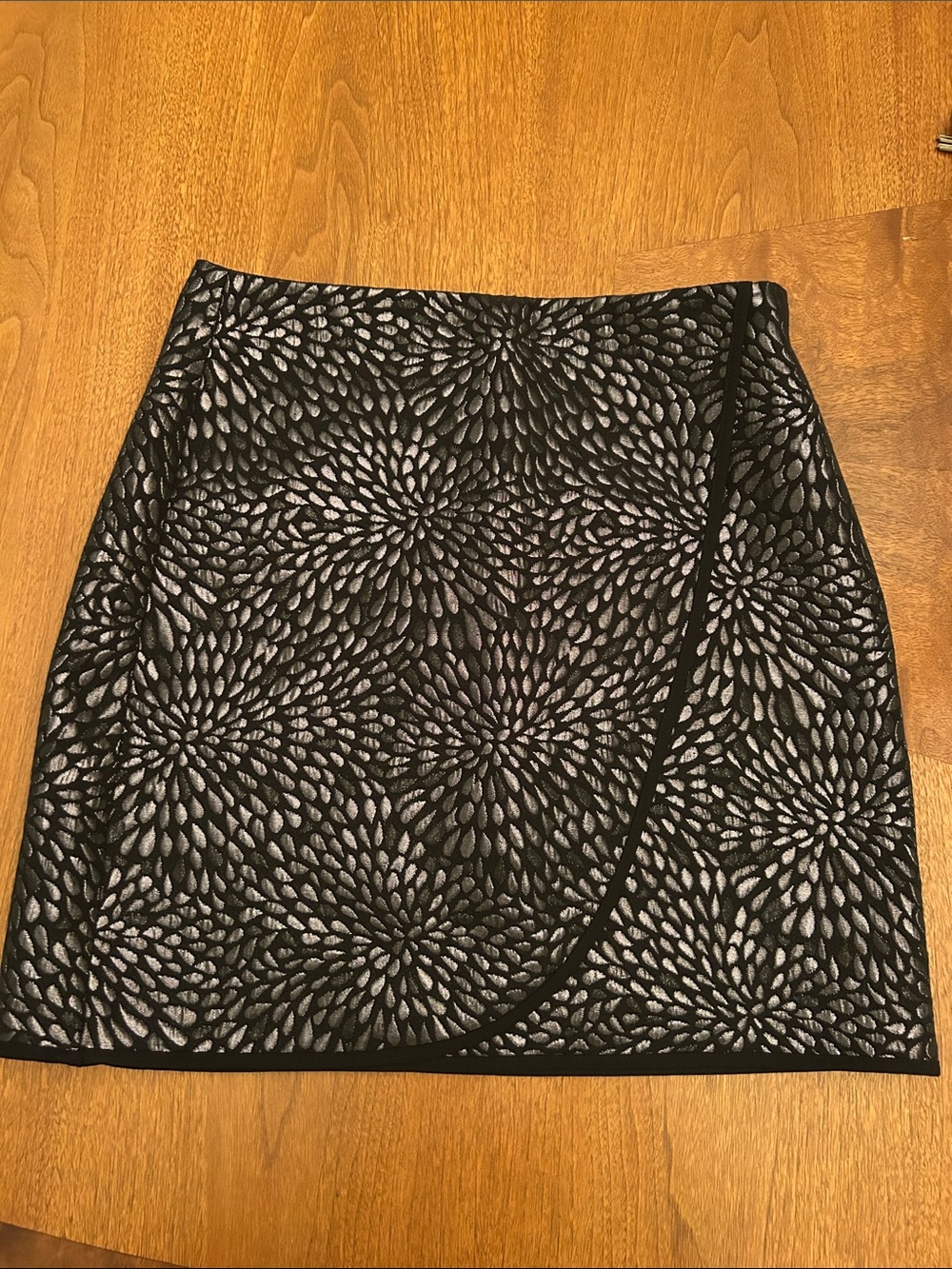 LOFT Black Mini Skirt with Silver Floral Burst Pattern